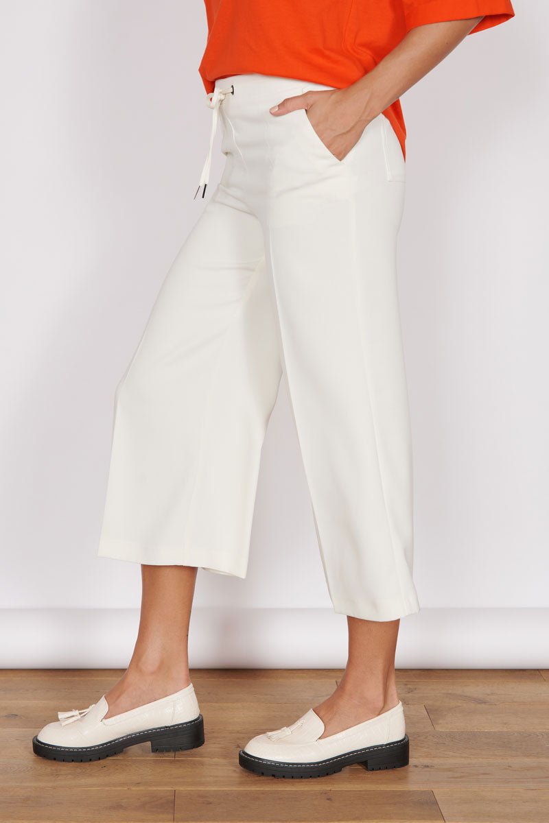 Cream Wolpoch cotton-gauze cropped trousers | CARAVANA | MATCHES UK